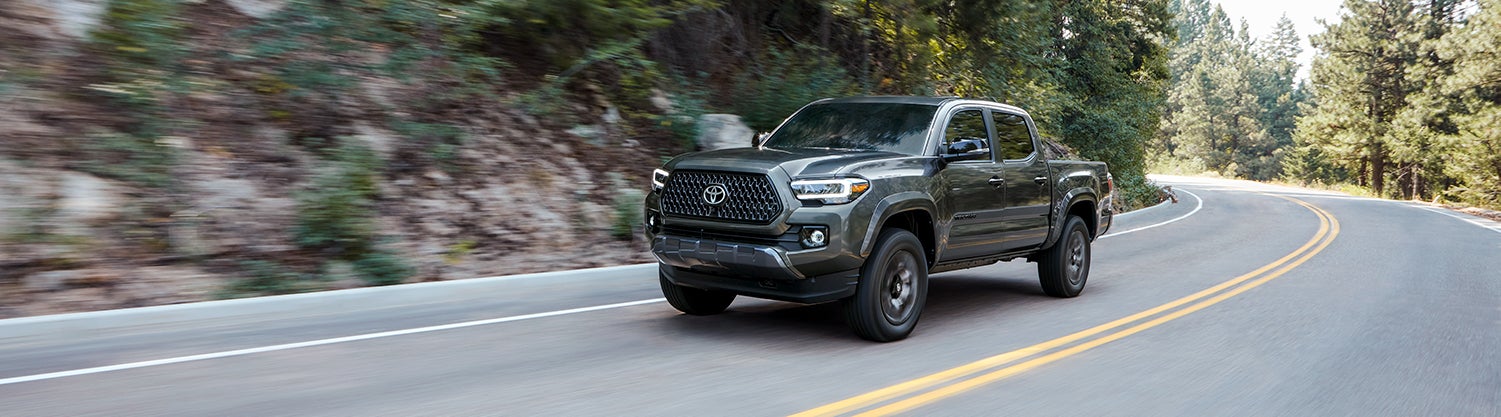 3 Main Benefits of Using OEM parts for your vehicle at Bennett Toyota of Lebanon of Lebanon | 2021 Toyota Tacoma driving down mountain road