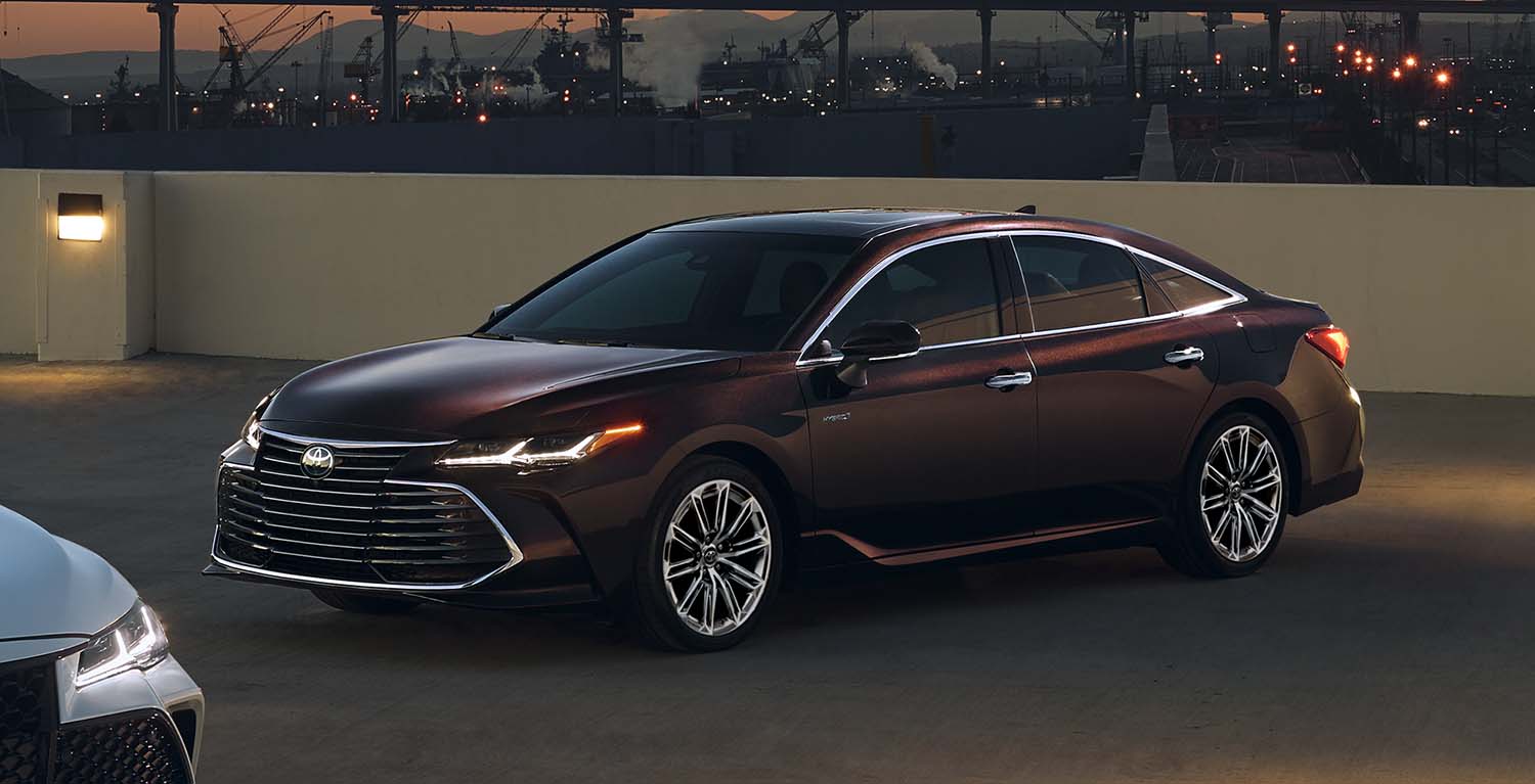Toyota Hybrid for Everyone at Bennett Toyota of Lebanon | 2022 Toyota Avalon parked on top of a parking garage
