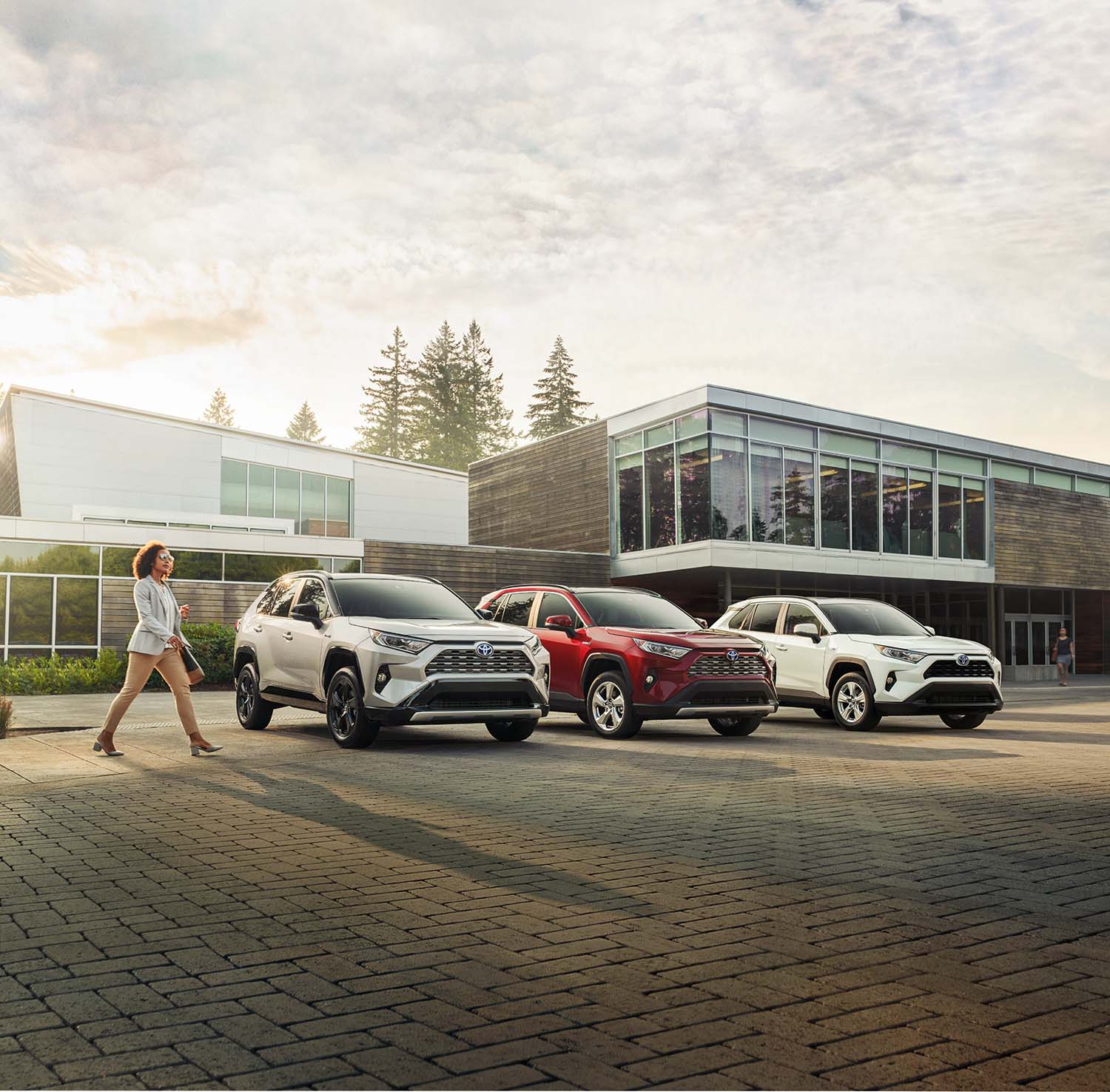 Toyota Hybrid for Everyone at Bennett Toyota of Lebanon | Three 2022 Toyota RAV4s parked in a line