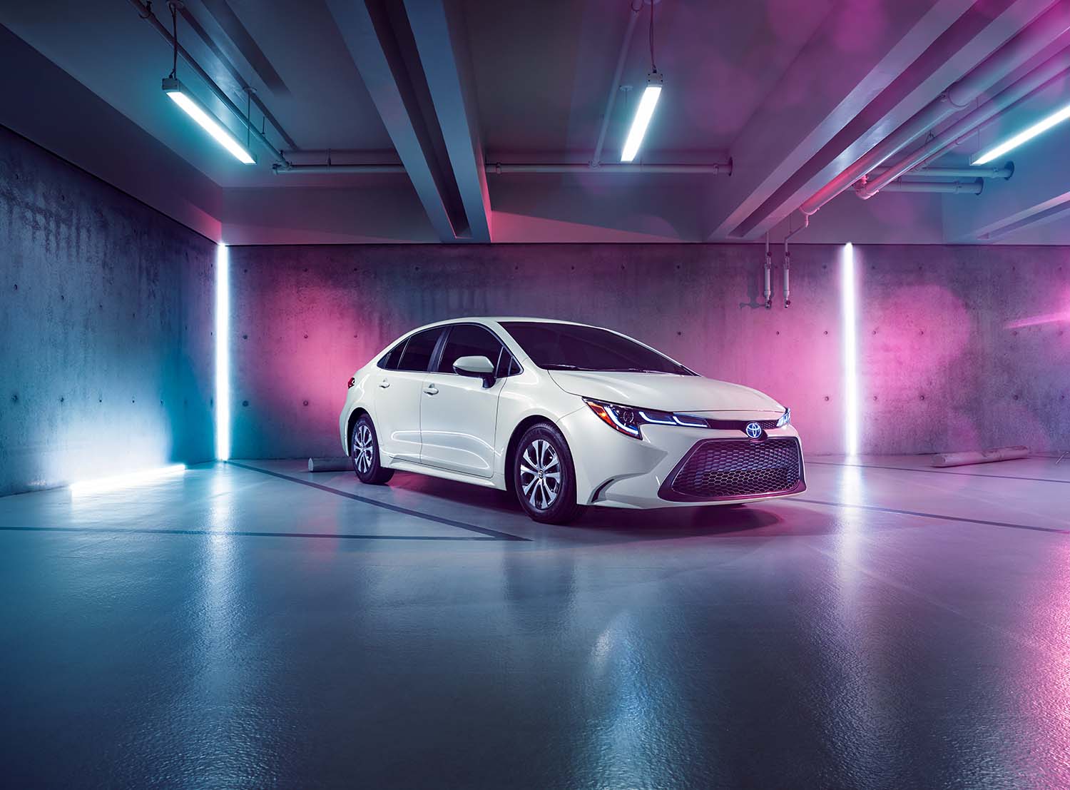 Toyota Hybrid for Everyone at Bennett Toyota of Lebanon | 2022 Toyota Corolla Hybrid parked in a showroom